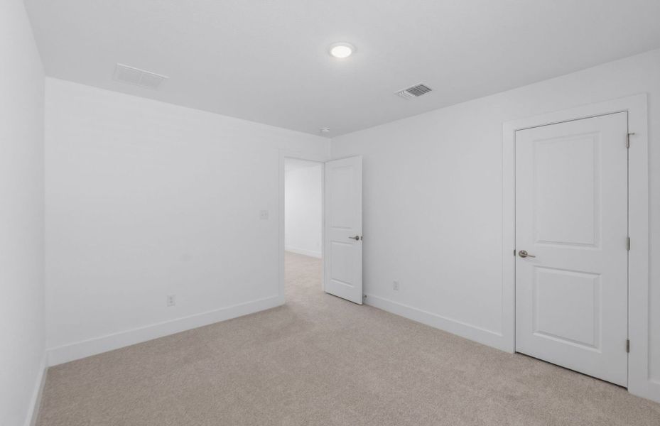 Spacious, unfurnished interior of a new home in Saddleback at Santa Rita Ranch, Liberty Hill (Image 49).