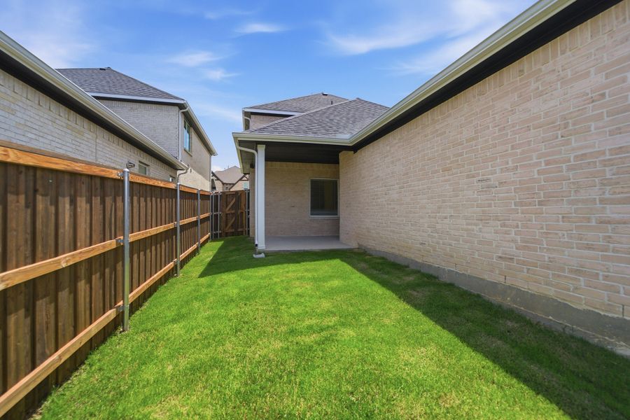 Exterior details and patio area of a home in La Terra, Celina (Image 21). Exterior details and patio area of a home in La Terra, Celina (Image 21).