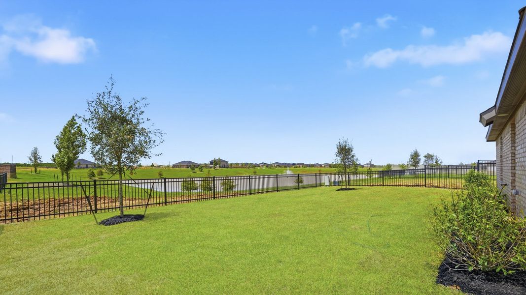 Exterior details and patio area of a home in Sunterra, Katy (Image 4).