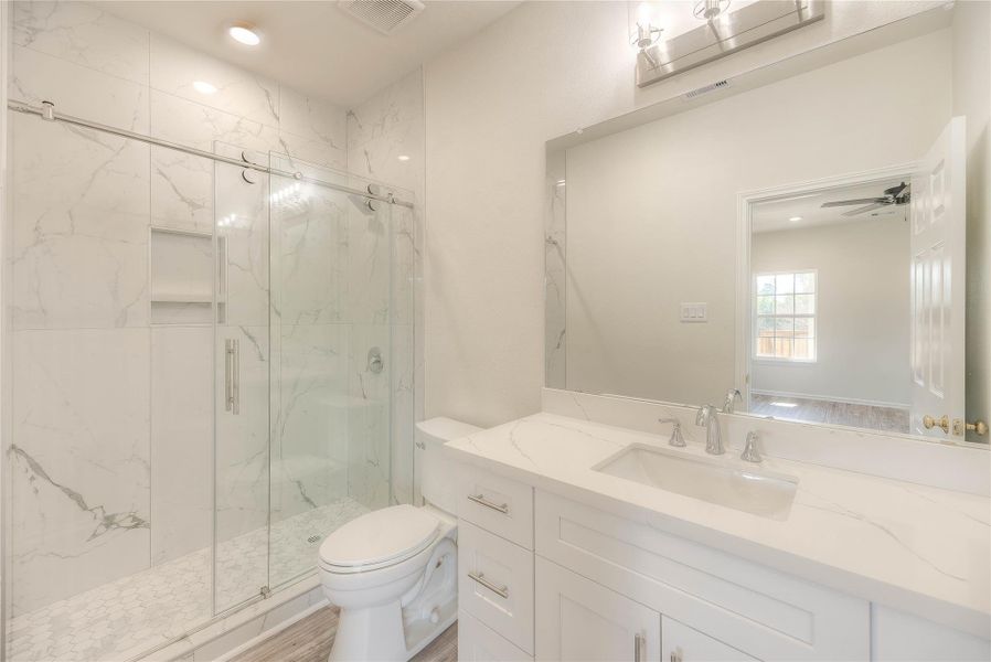 Master Bathroom with tub/shower.