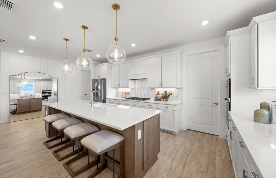 Representative furnished interior of a home built from the Palmary by DiVosta in BeachWalk by Manasota Key, Englewood (Image 15).