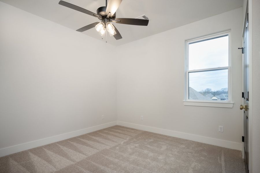 Representative unfurnished interior of a home built from the The Lydia by Reece Homes in Traditions, Bryan (Image 23).