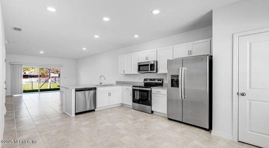 Furnished interior view inside a new home in Sabal Terrace, Jacksonville (Image 12).