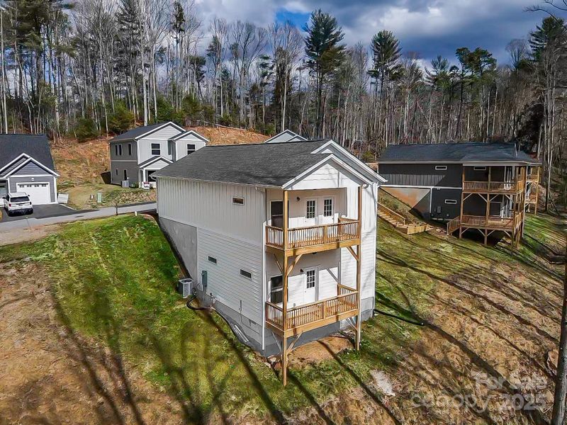 Front exterior of a new home in , Asheville, NC, highlighting curb appeal (Image 18).