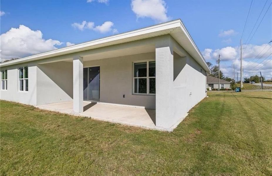 Exterior details and patio area of a home in , Ocala (Image 3).