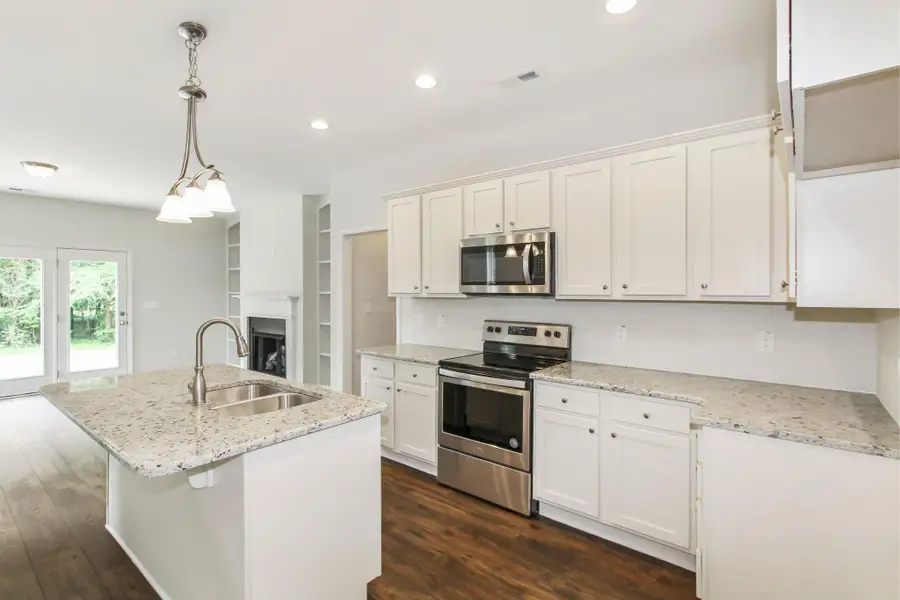 Representative furnished interior of a home built from the Furyk by RiverWILD Homes in Riverwood Ranch, Clayton (Image 5).