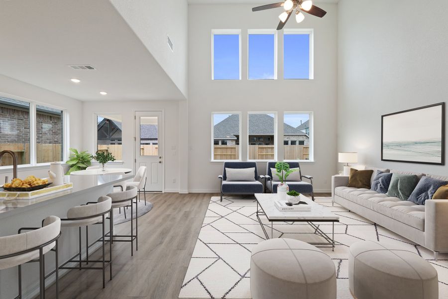 Two story family room. Note: Sample product photo - actual exterior and interior selections may vary by homesite