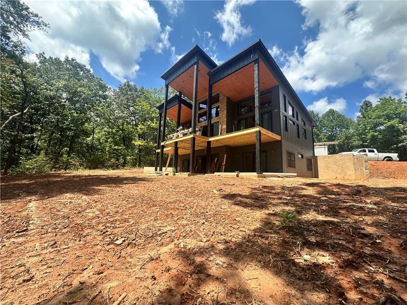 Front exterior of a new home in , Morganton, GA, highlighting curb appeal (Image 12).