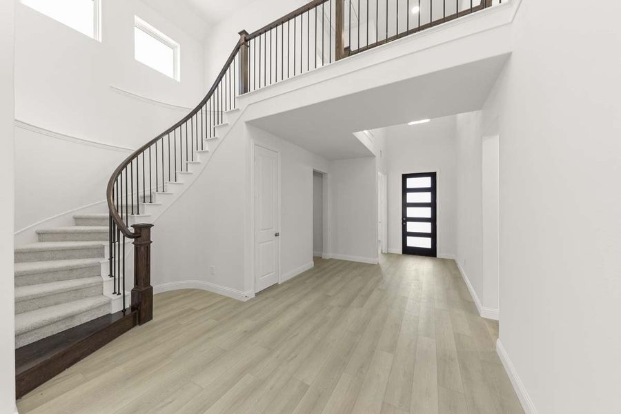 Spacious, unfurnished interior of a new home in The Reserve at Spiritas Ranch, Little Elm (Image 21).
