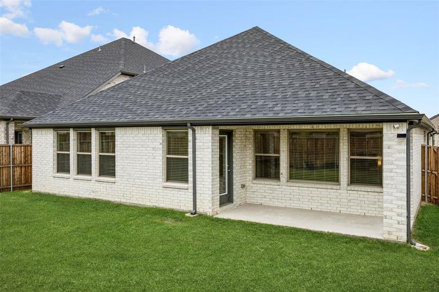 Exterior details and patio area of a home in LakePointe, Lavon (Image 22).
