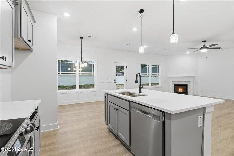 Furnished interior view inside a new home in Wood Creek Landing, Leland (Image 7).