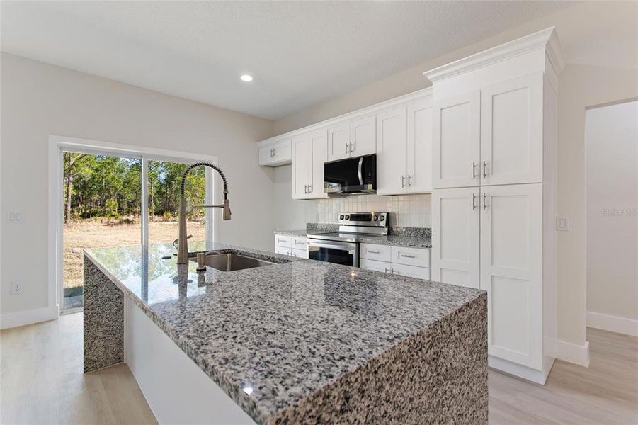 Furnished interior view inside a new home in , Indian Lake Estates (Image 9).