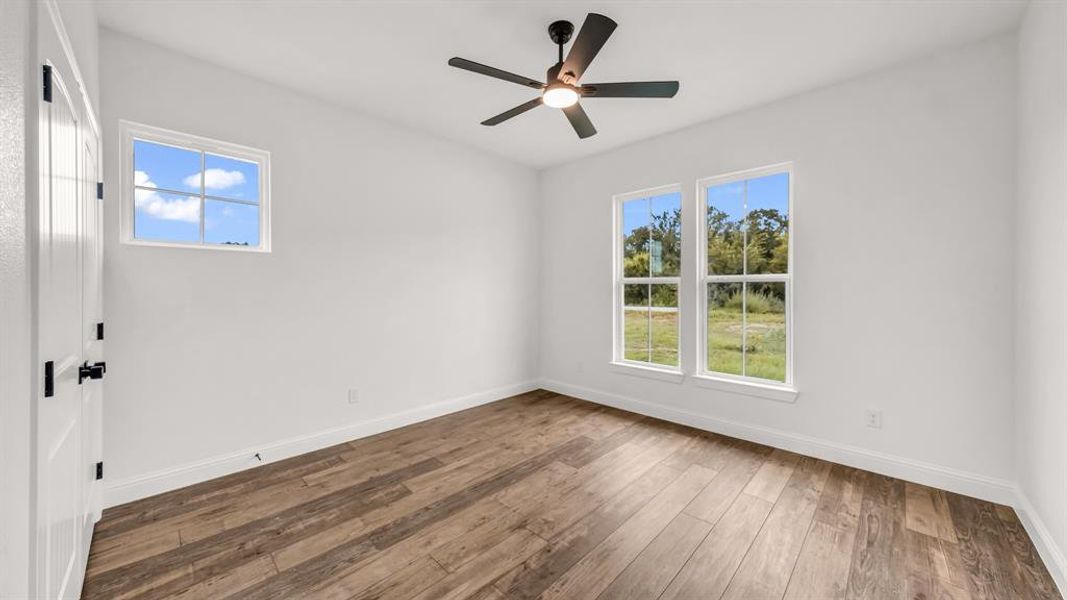 Spacious, unfurnished interior of a new home in Oak Water Ranch, Granbury (Image 21).