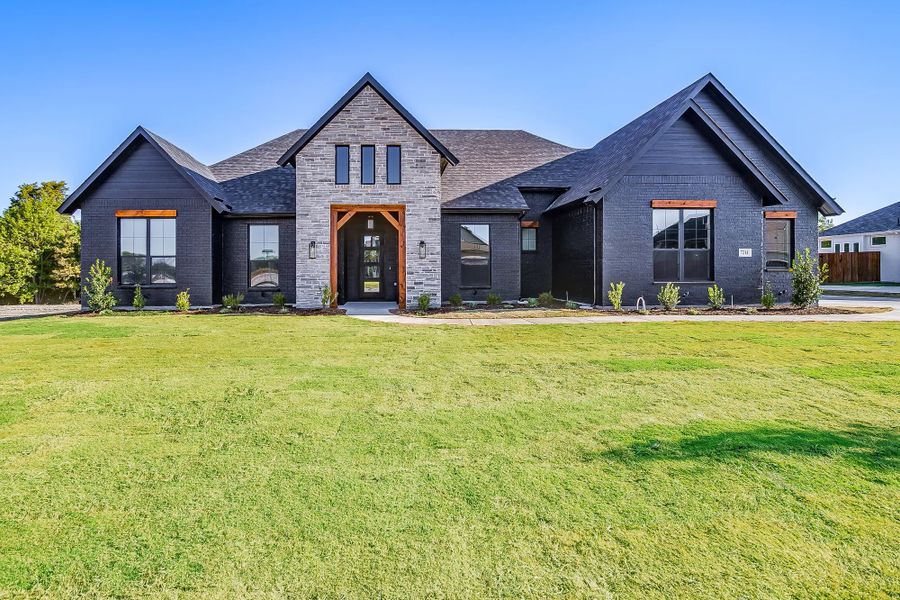 Representative exterior photo of a completed home built from the The Colin by Elmwood Custom Homes in Matthews Farm, Venus, TX (Image 1). Representative exterior photo of a completed home built from the The Colin by Elmwood Custom Homes in Matthews Farm, Venus, TX (Image 1).