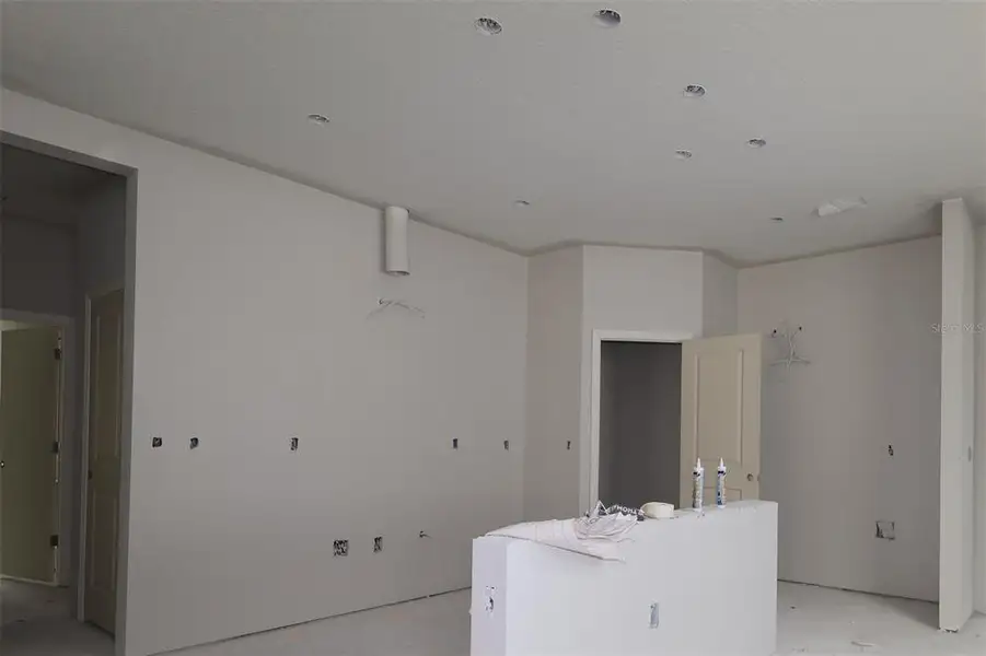 Furnished interior view inside a new home in Emerson Pointe, Apopka (Image 7).