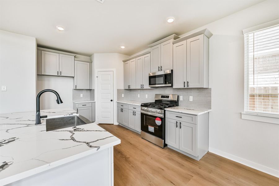 Furnished interior view inside a new home in , Manvel (Image 7). Furnished interior view inside a new home in , Manvel (Image 7).