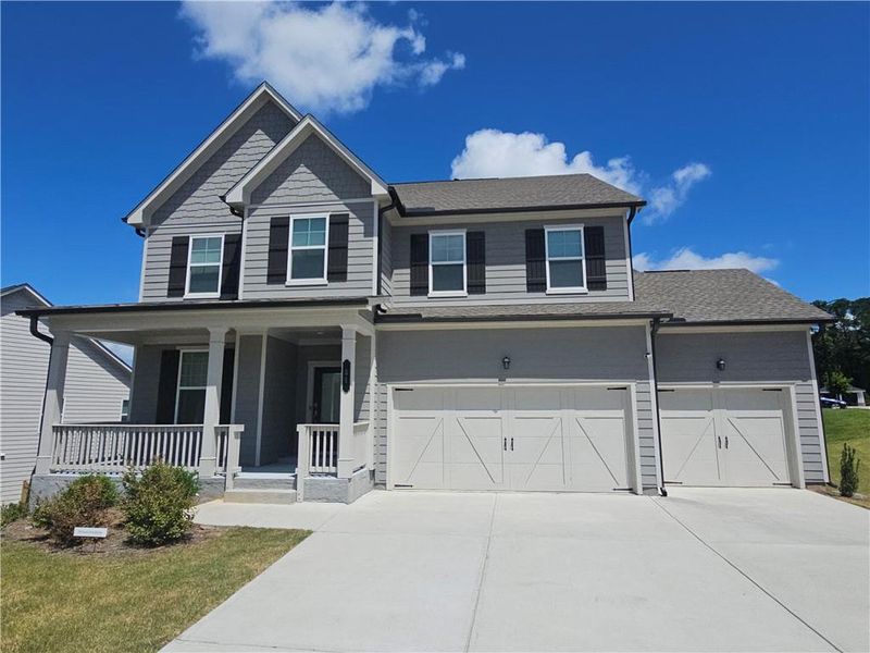 Front exterior of a new home in Park at Ansleigh Farms, Dallas, GA, highlighting curb appeal (Image 8).