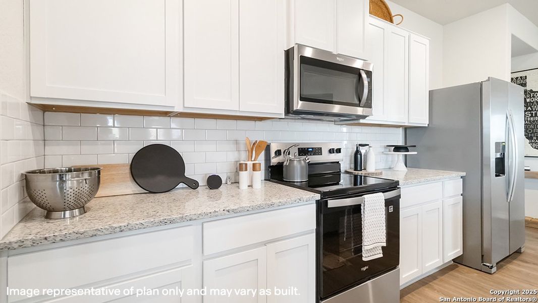 Furnished interior view inside a new home in Riverstone at Westpointe, San Antonio (Image 29).