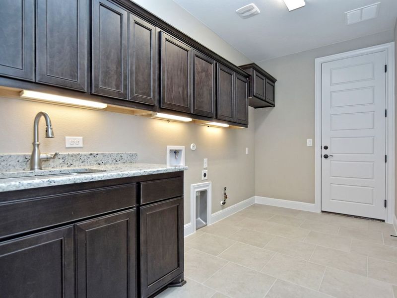 Representative furnished interior of a home built from the Madera II by Giddens Homes in Scofield Farms Estates, Georgetown (Image 258).