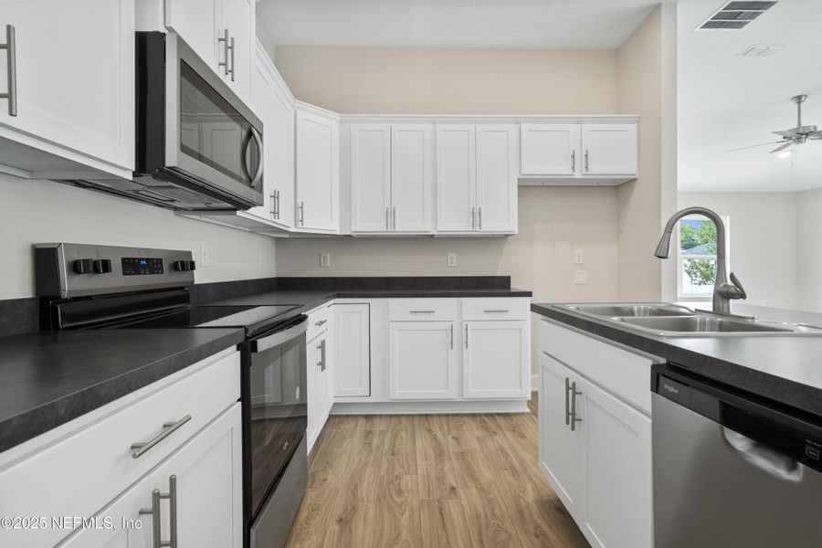 Furnished interior view inside a new home in Summerglen, Jacksonville (Image 5). Furnished interior view inside a new home in Summerglen, Jacksonville (Image 5).