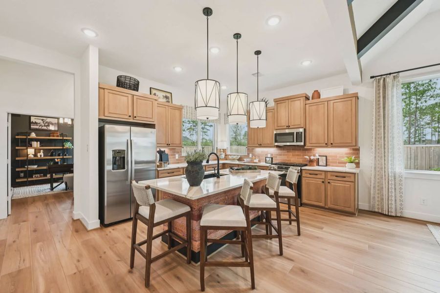Representative furnished interior of a home built from the Tanlay by Chesmar Homes in The Woodland Hills Chateau, Willis (Image 5).