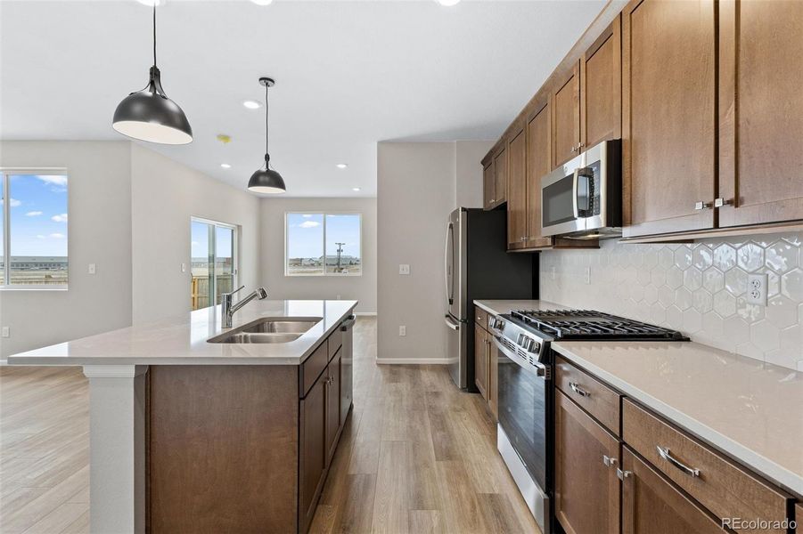 Furnished interior view inside a new home in The Cottages Collection at Ridgeline Vista, Brighton (Image 5).