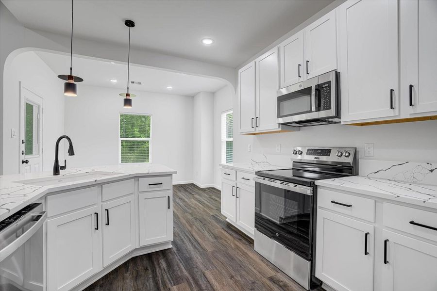 Furnished interior view inside a new home in , Kenefick (Image 9).