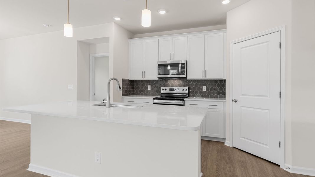 Representative furnished interior of a home built from the Bristol by D.R. Horton in The Villas at Kinsley, Jamestown (Image 6). Representative furnished interior of a home built from the Bristol by D.R. Horton in The Villas at Kinsley, Jamestown (Image 6).