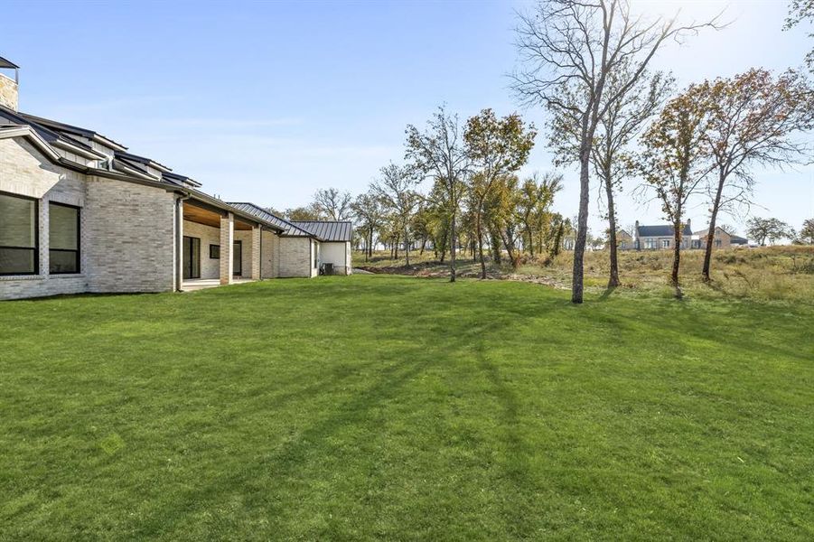Exterior details and patio area of a home in , Weatherford (Image 3).
