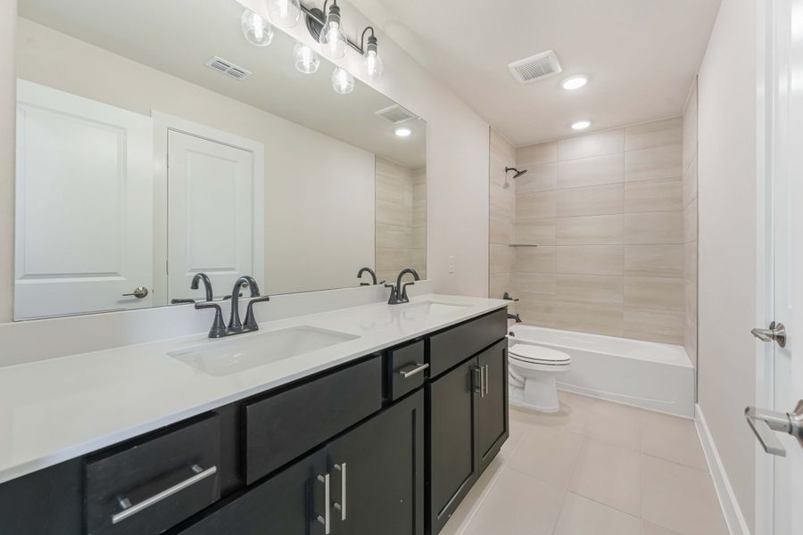 Furnished interior view inside a new home in Union Park, Little Elm (Image 8). Furnished interior view inside a new home in Union Park, Little Elm (Image 8).