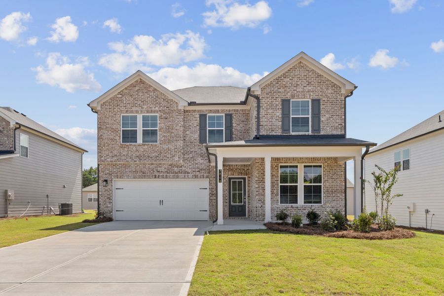 A house with a driveway. A house with a driveway.