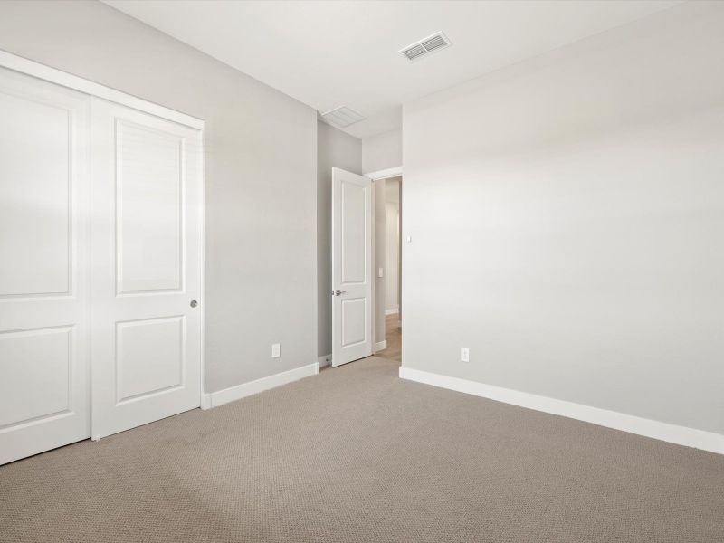 Spacious, unfurnished interior of a new home in White Tank Foothills Reserve Series, Waddell (Image 17).