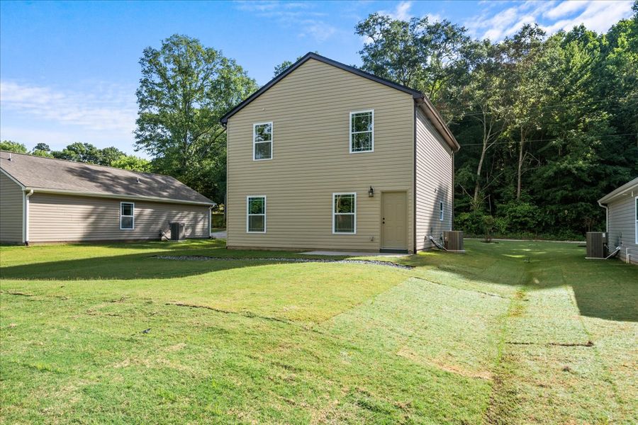 Representative exterior photo of a completed home built from the Riley by Enchanted Homes in Gentry Place, Spartanburg, SC (Image 12).