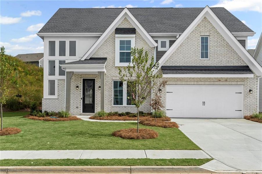 Front exterior of a new home in Twin Lakes, Hoschton, GA, highlighting curb appeal (Image 18).