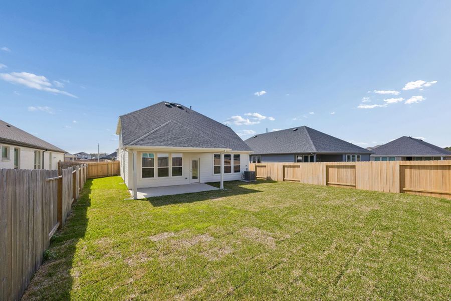 Exterior details and patio area of a home in Montgomery Bend, Montgomery (Image 3).