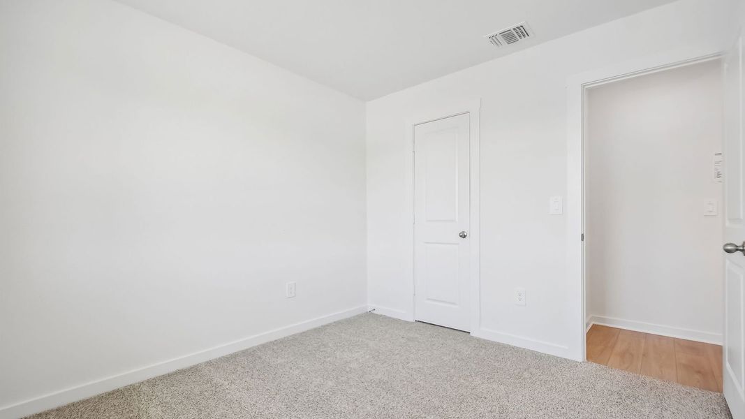 Spacious, unfurnished interior of a new home in Trails at Wildhorse, Austin (Image 32).