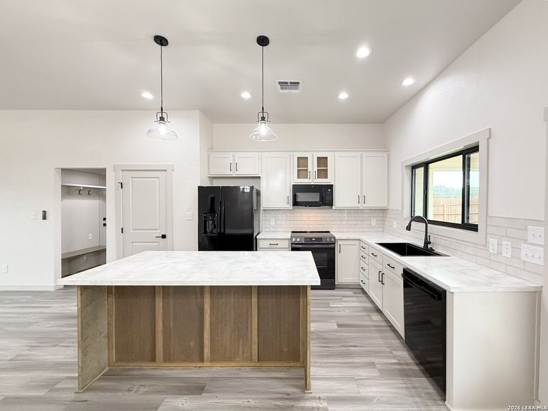 Furnished interior view inside a new home in , Devine (Image 13).