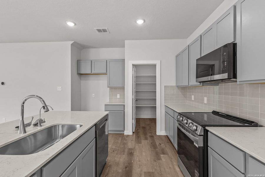 Furnished interior view inside a new home in Agave, San Antonio (Image 10).