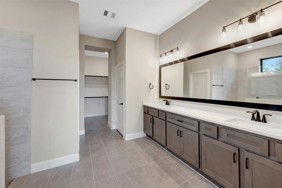 Furnished interior view inside a new home in COLTON - Reserve Collection, Todd Mission (Image 14).
