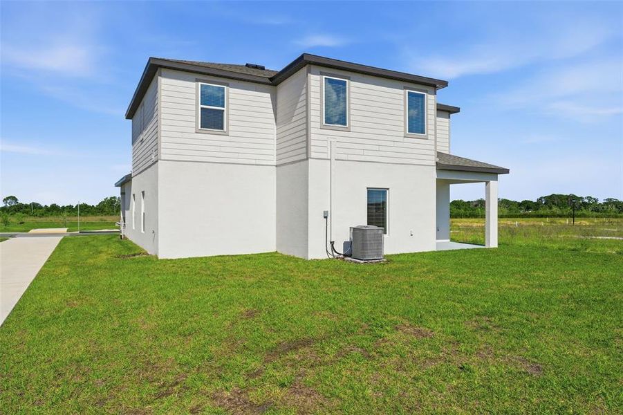 Exterior details and patio area of a home in Gum Lake Preserve, Lake Alfred (Image 28).
