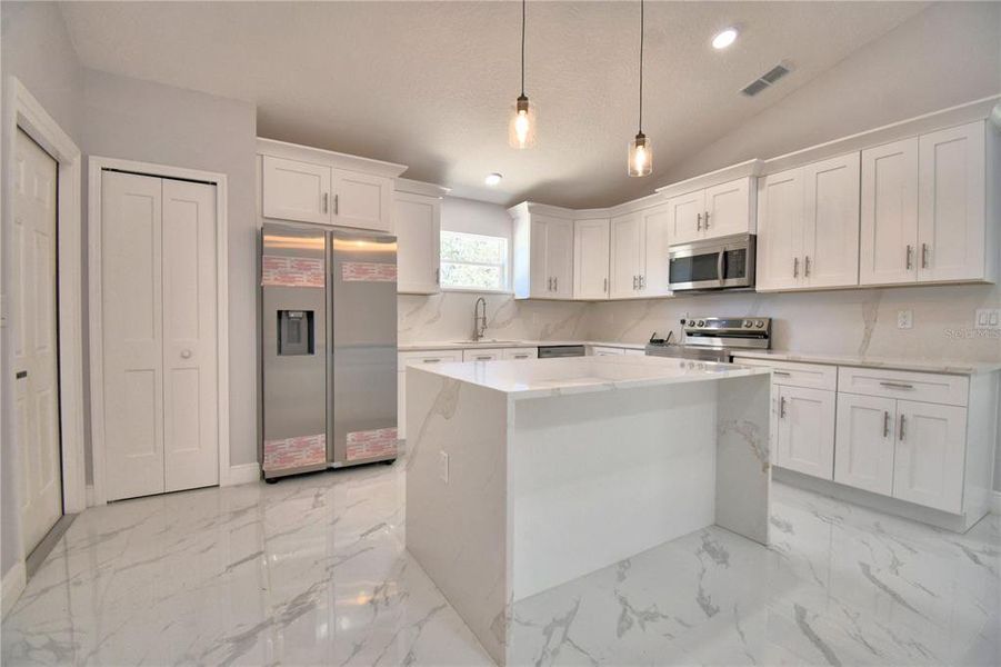 Furnished interior view inside a new home in , Poinciana (Image 7). Furnished interior view inside a new home in , Poinciana (Image 7).