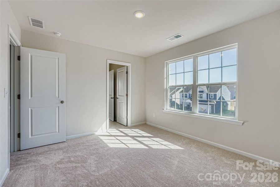 Spacious, unfurnished interior of a new home in Shannon Woods: Walk & Enclave, Maiden (Image 8).