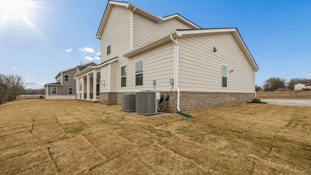 Representative exterior details of a home built from the Tisdale by D.R. Horton in Harvest Point, Spring Hill (Image 34). Representative exterior details of a home built from the Tisdale by D.R. Horton in Harvest Point, Spring Hill (Image 34).