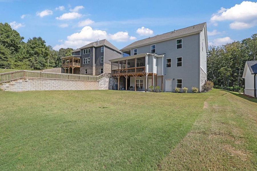Exterior details and patio area of a home in , Flowery Branch (Image 27).