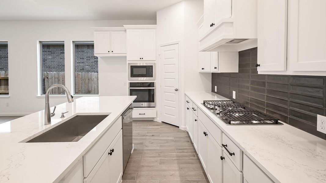 Furnished interior view inside a new home in Crosswinds 40', Kyle (Image 10).