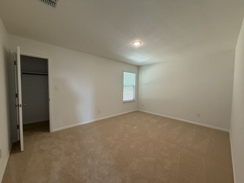 Spacious, unfurnished interior of a new home in The Hills of Bear Creek, Austin (Image 15).