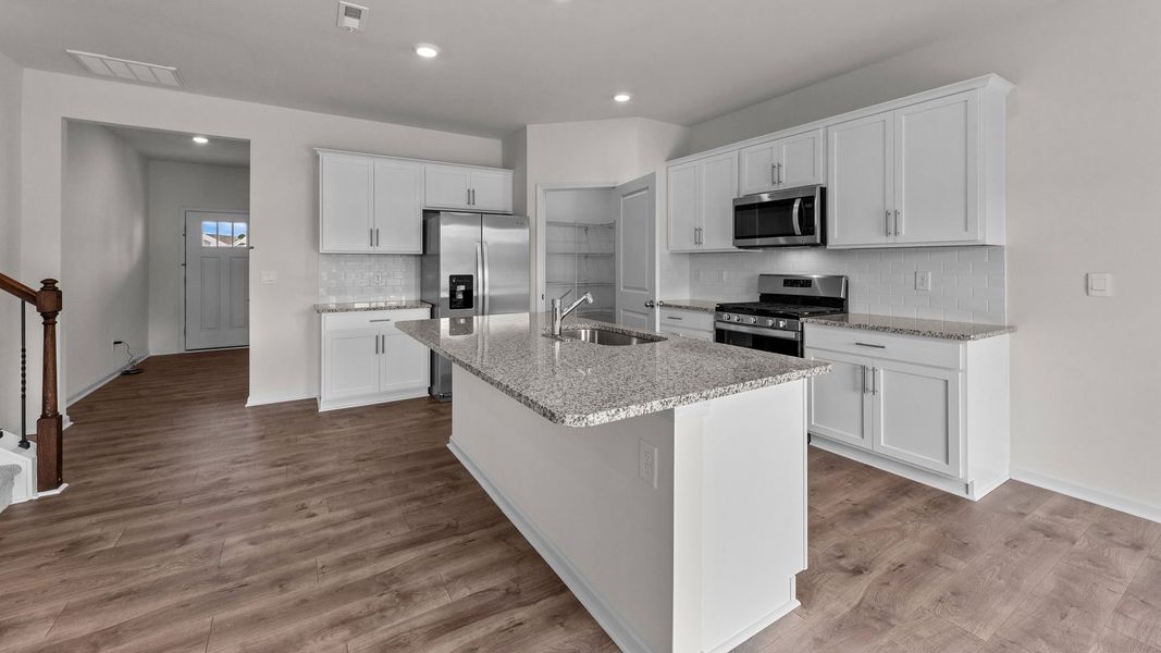 Furnished interior view inside a new home in Beaver Dam Crossing, Bailey (Image 5).