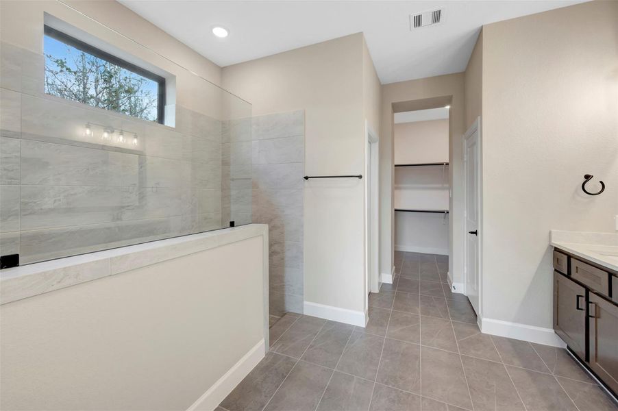 Furnished interior view inside a new home in COLTON - Reserve Collection, Todd Mission (Image 16).