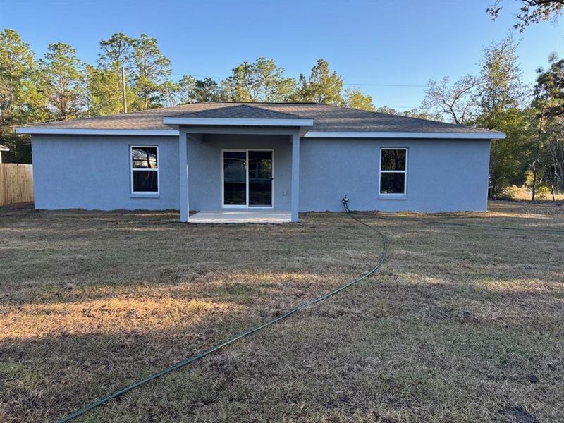 Exterior details and patio area of a home in , Citrus Springs (Image 2).