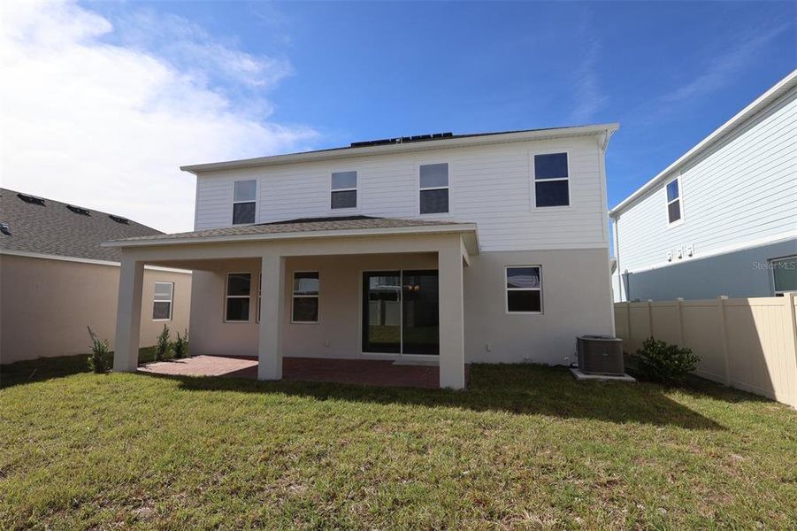 Exterior details and patio area of a home in Eden at Crossprairie, St. Cloud (Image 2).